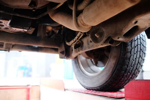 Mechanic working on car